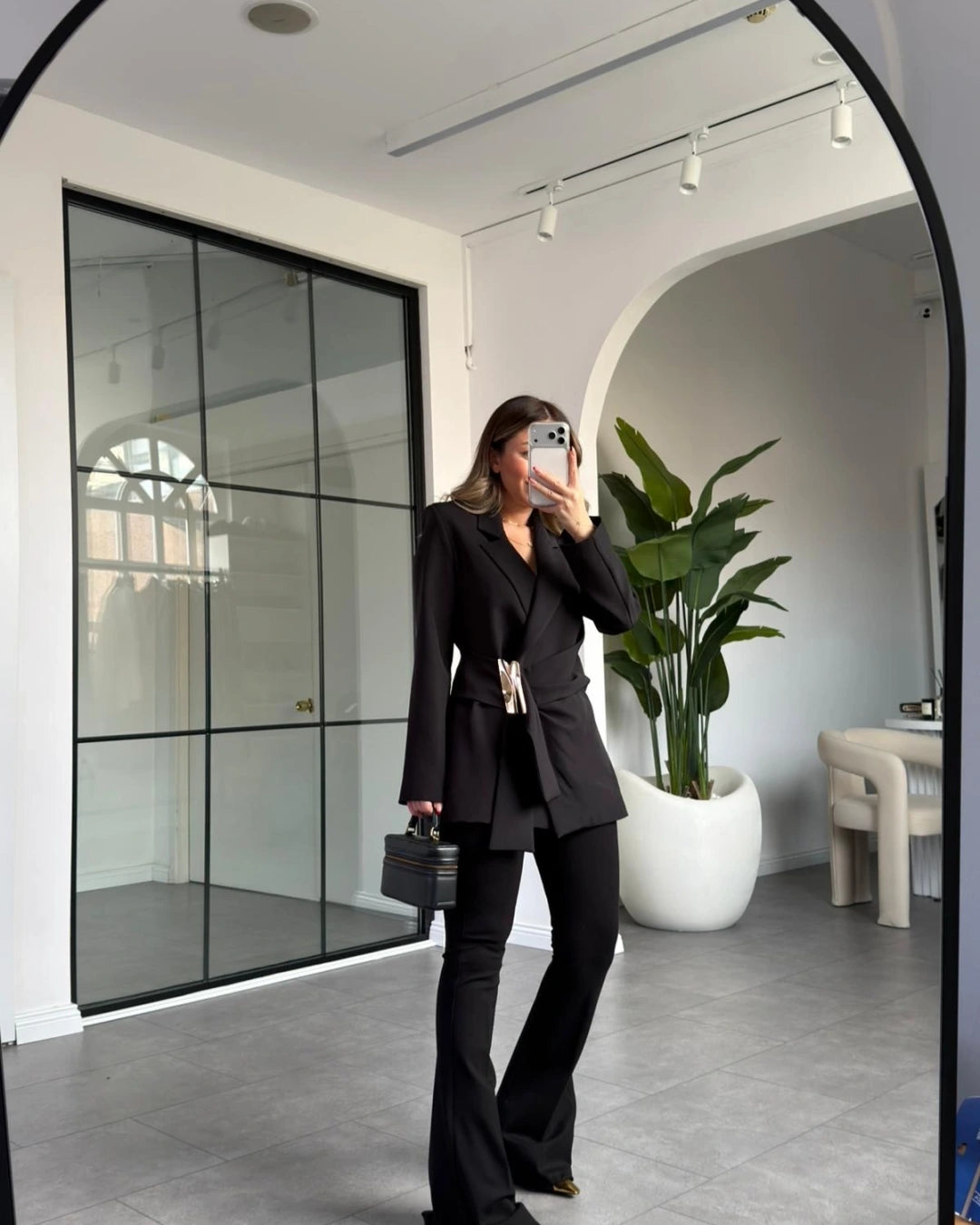 Black blazer with gold buckle