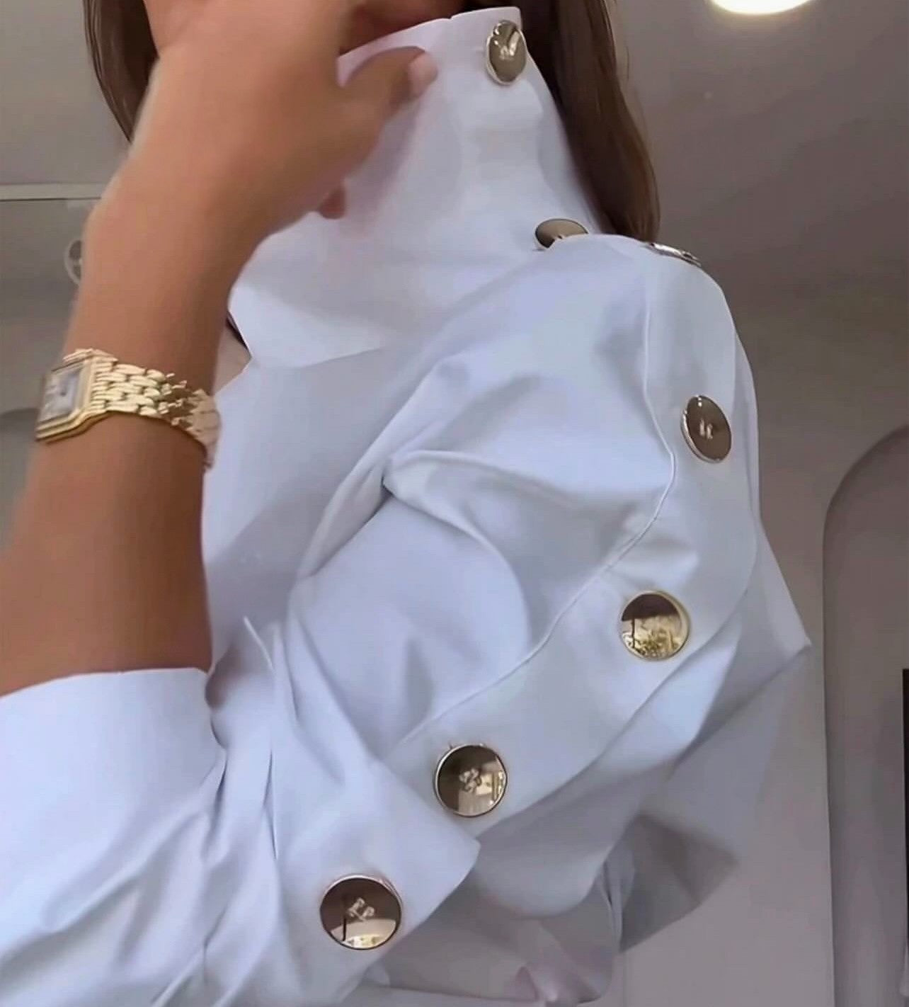 White shirt with side gold buttons