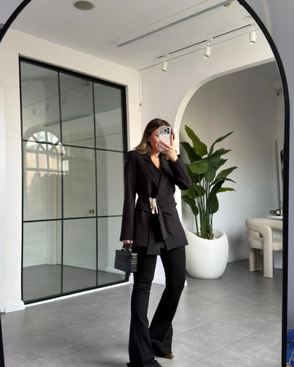 Black blazer with gold buckle